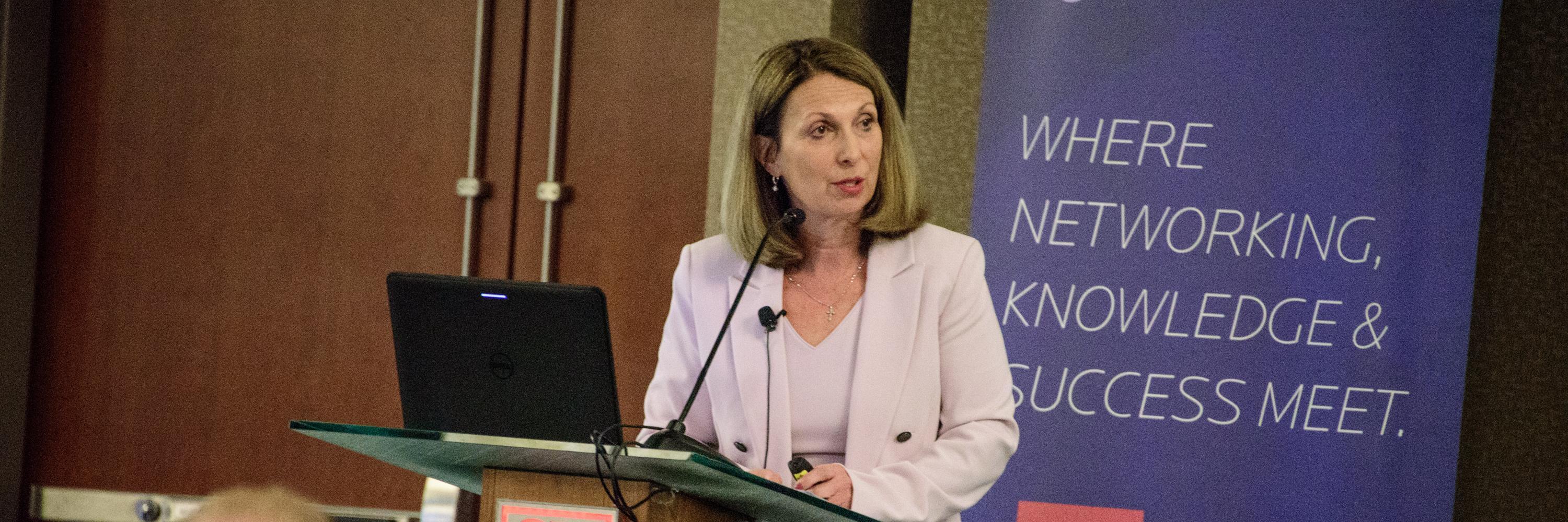 Keynote speaker Dr. Carol Wittmeyer giving a speech