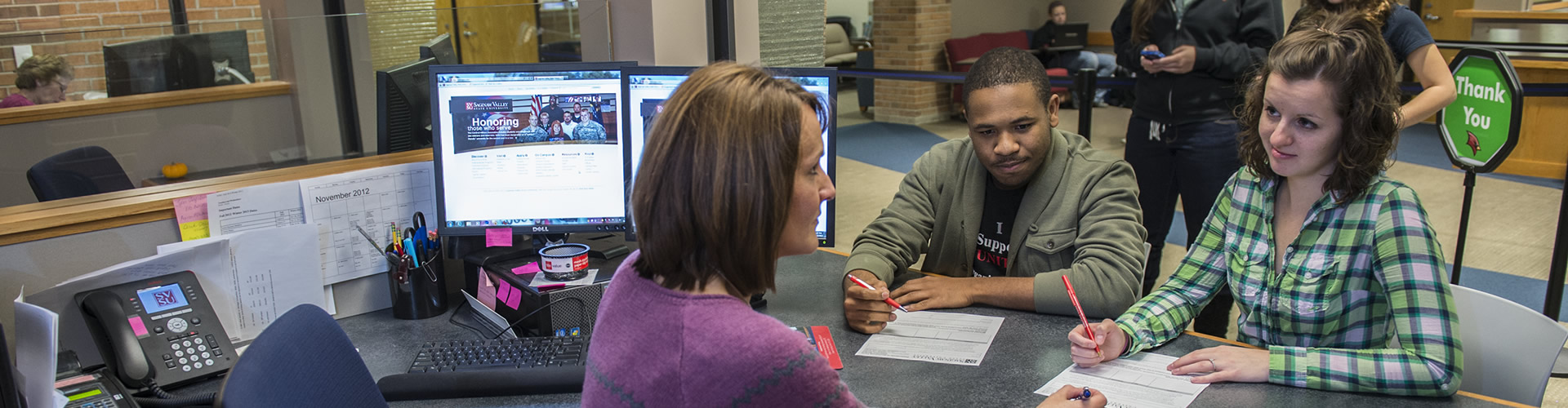 Students getting assistance with Financial Aid