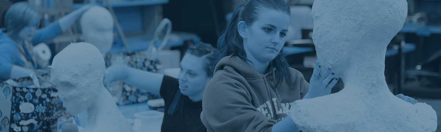 Students working on sculptures