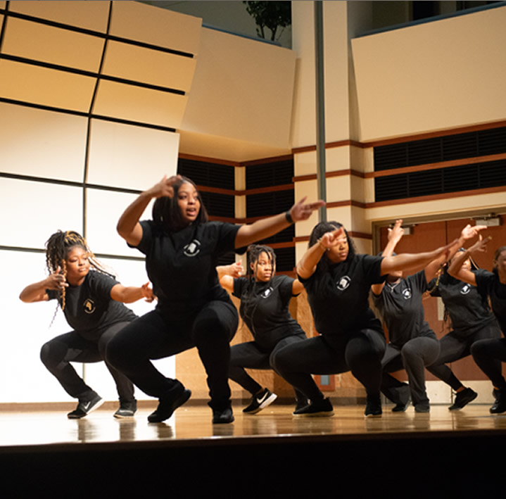 Students performing on stage