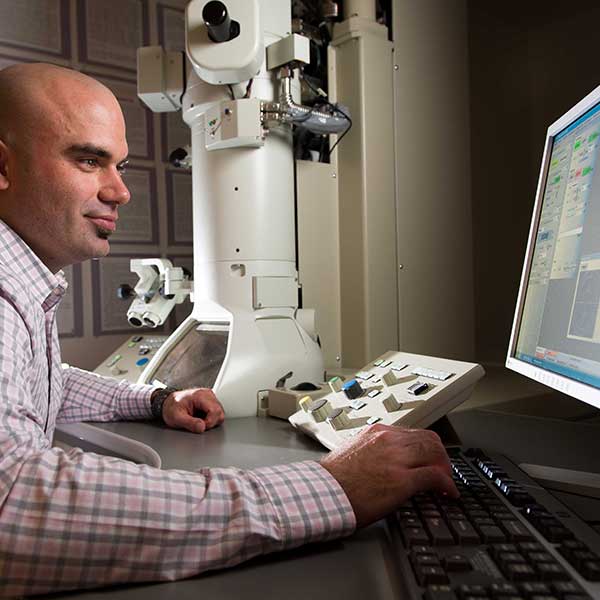 Person analyzing data on a computer