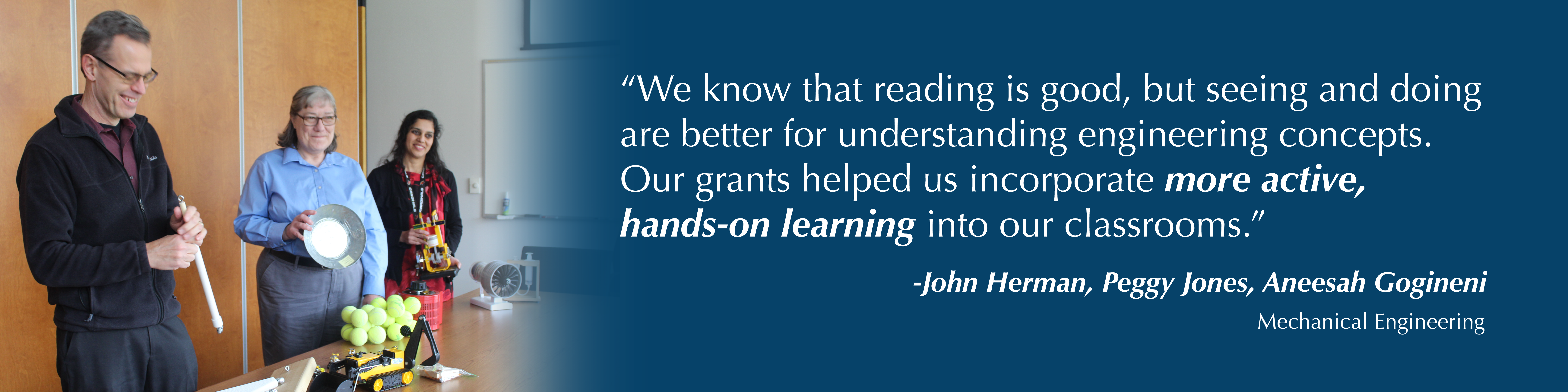 Engineering faculty demonstrate their active learning equipment.