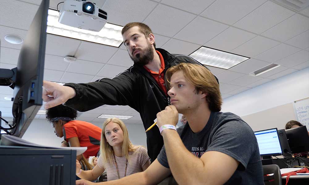 students getting help with financial aid