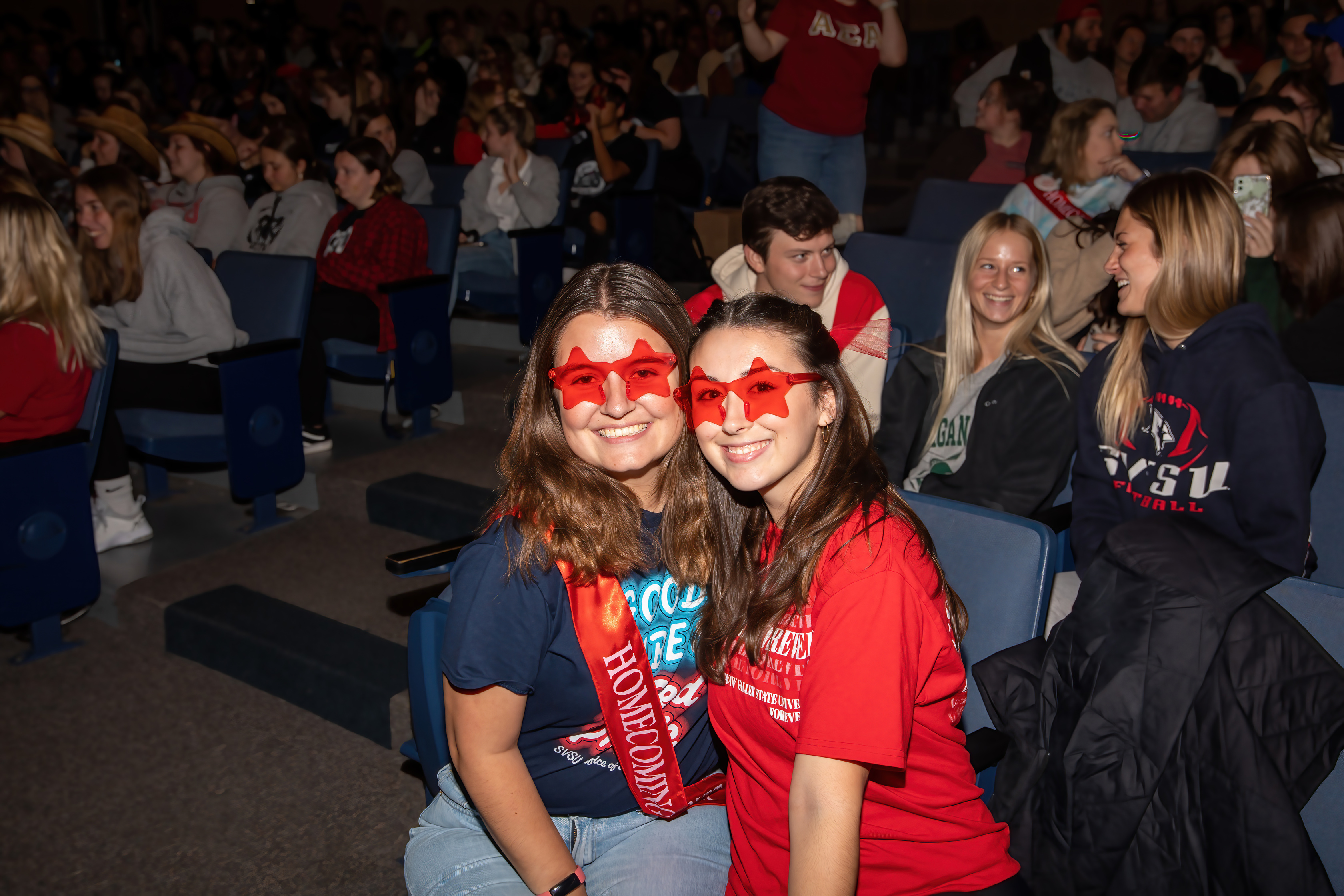 student at event, wearing fun glasses