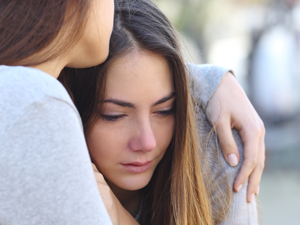 Young Girl Comforted