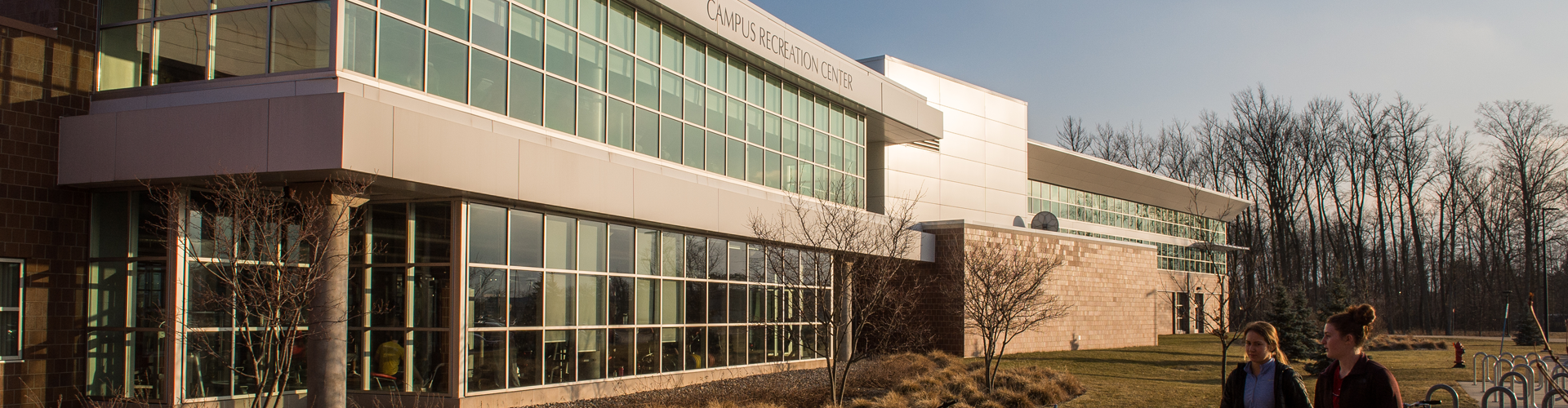 students walking outside of the Campus Recreation Center 
