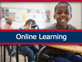 An elementary class working in their workbooks. A ribbon that says 