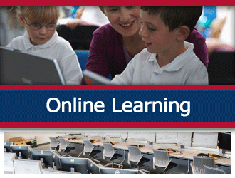 A teacher helps two young students work on laptops. A ribbon that says 