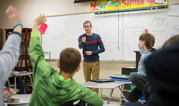 Teacher at whiteboard