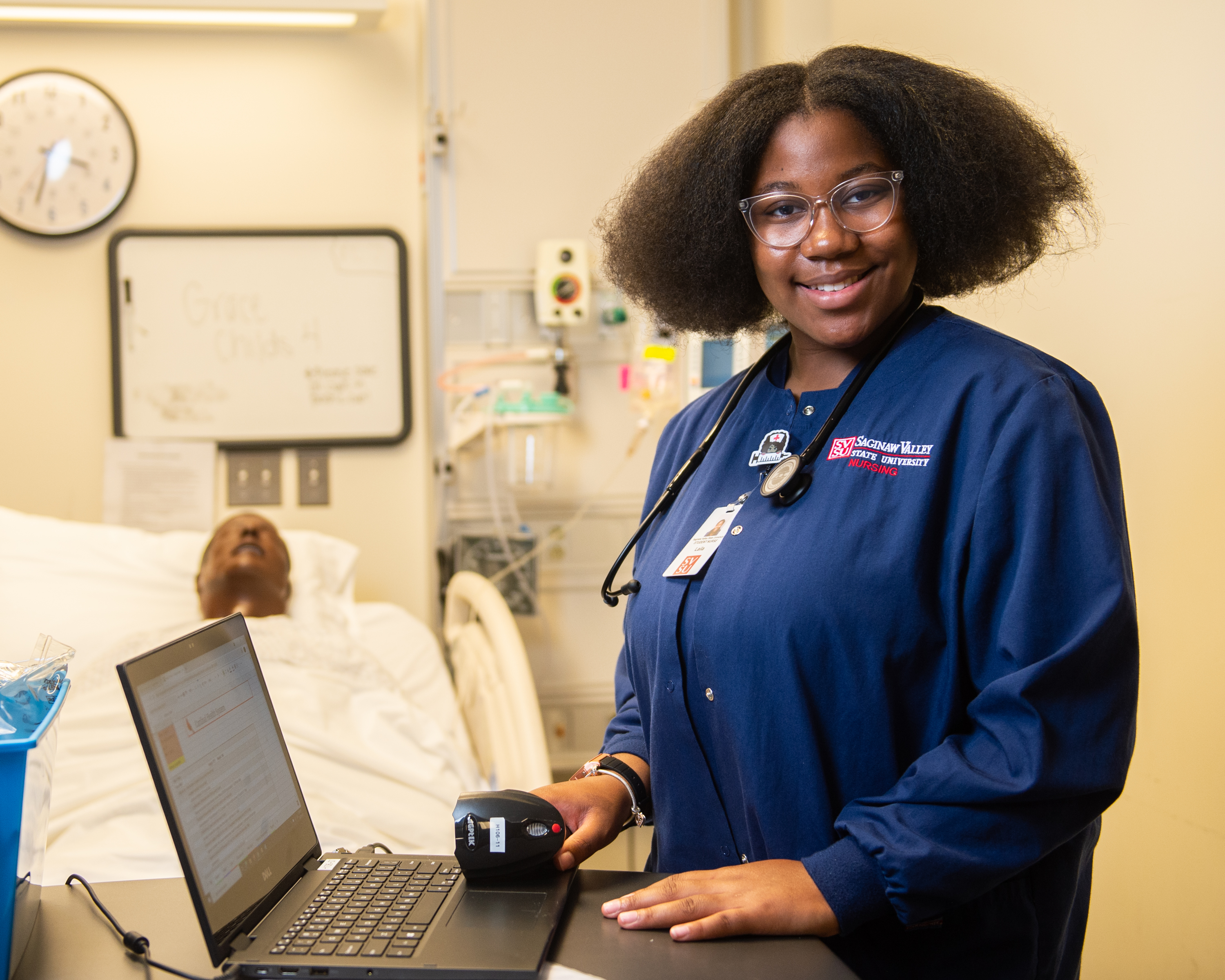 A nursing student posing