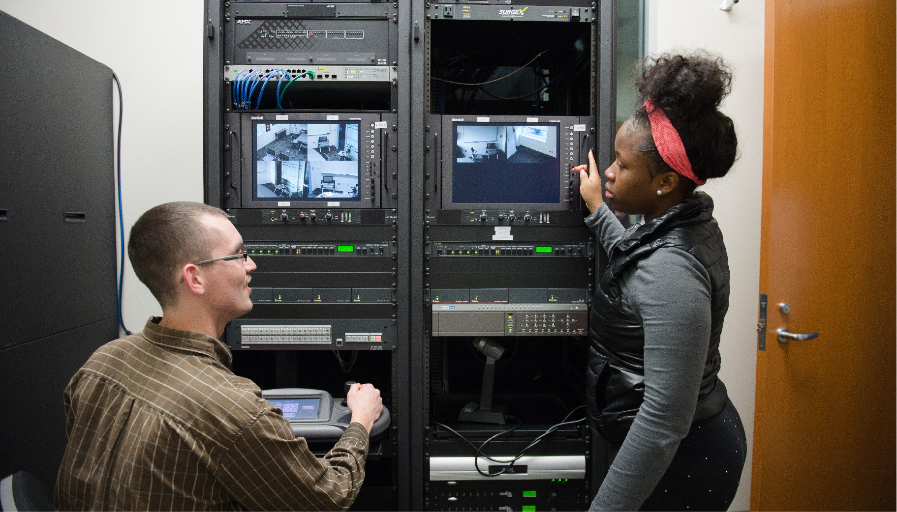 A professor talking to a student