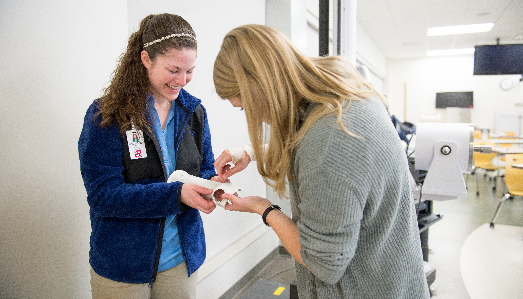 Someone being monitored doing occupational therapy