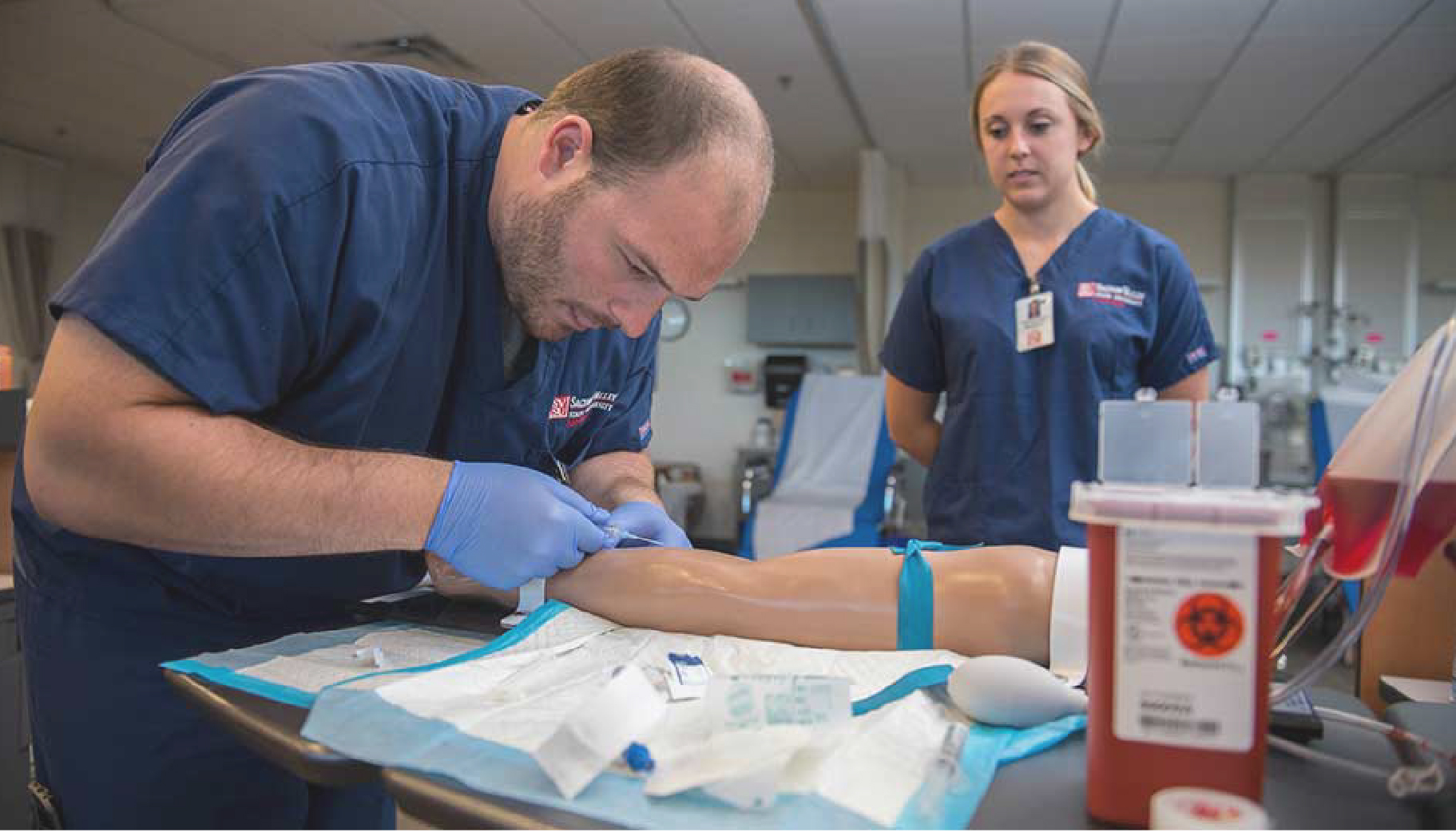 Two nursing students working together