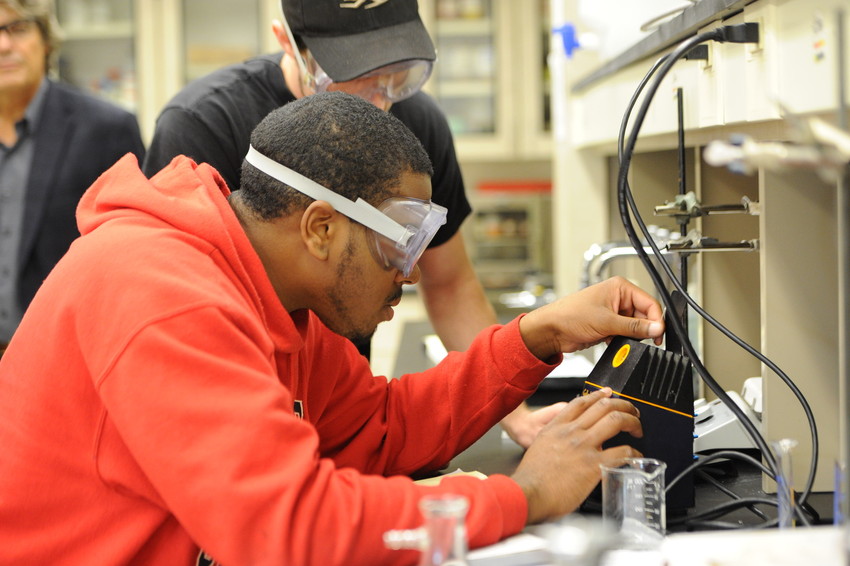 Students work in a chemistry lab.