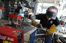 A student works on a mechanical engineering project.