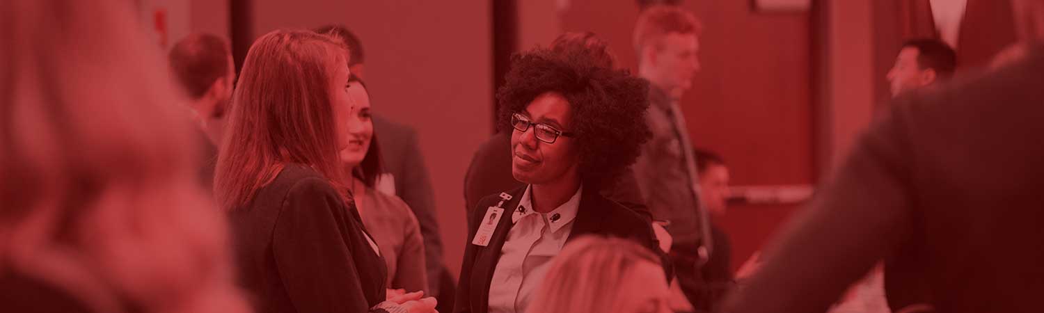 Student talking to employer