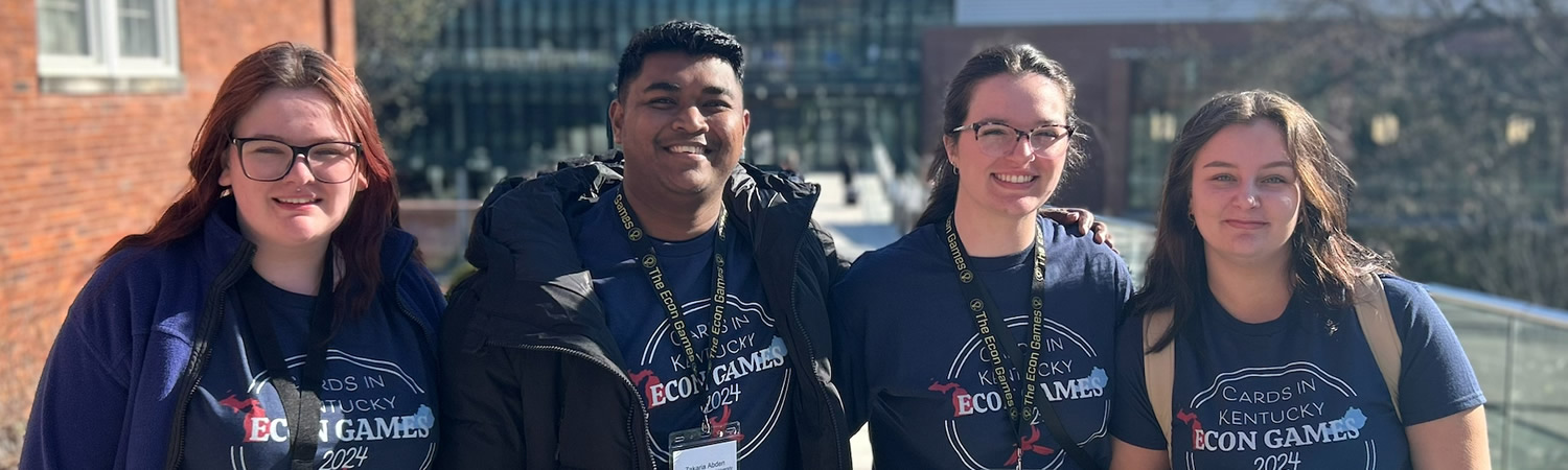 Four students with award