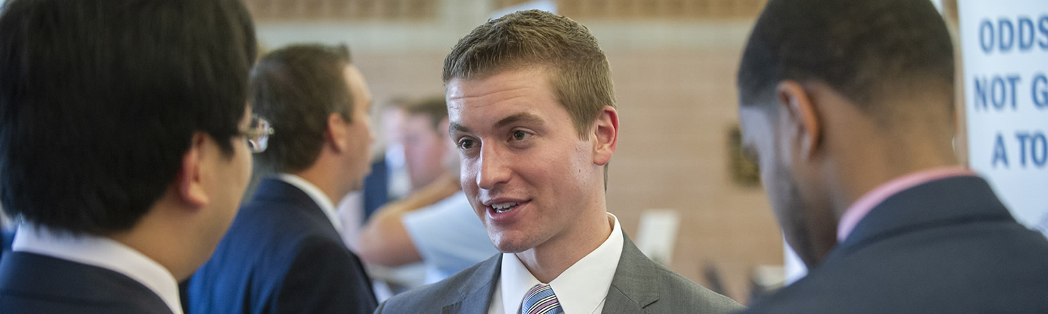 Business student talking with other students