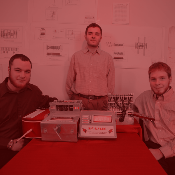 Electrical Engineering students with a guitar project