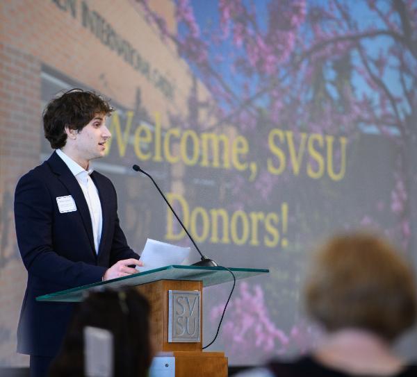 Person speaking at podium
