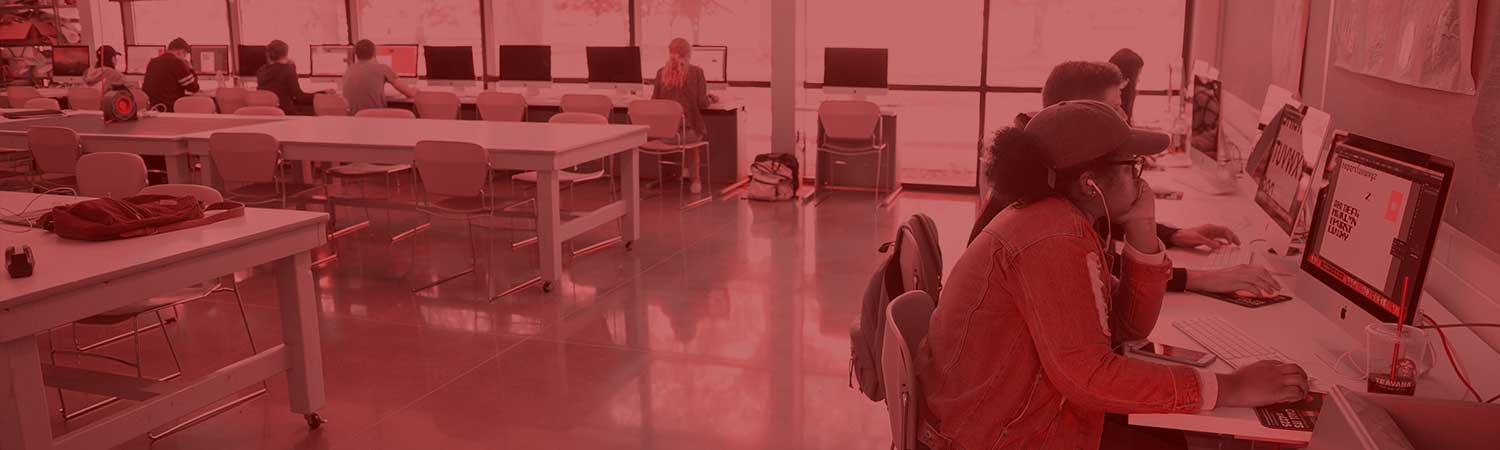 student working in graphic design class