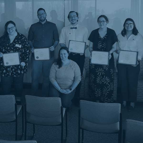 Group photo with certificates