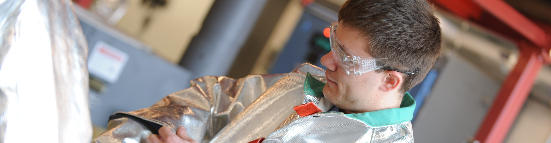 Student in protective gear working in the ITL 