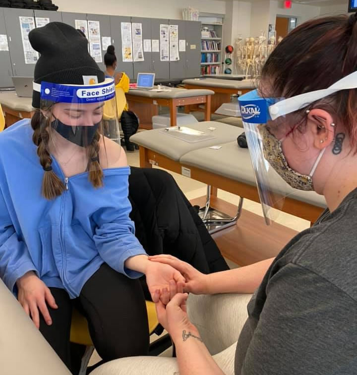 Students practicing hand movements