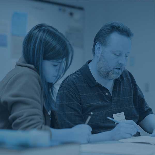 Student receiving math help from faculty