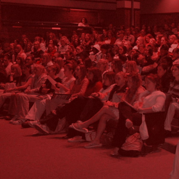 Auditorium full of students attending Math Day