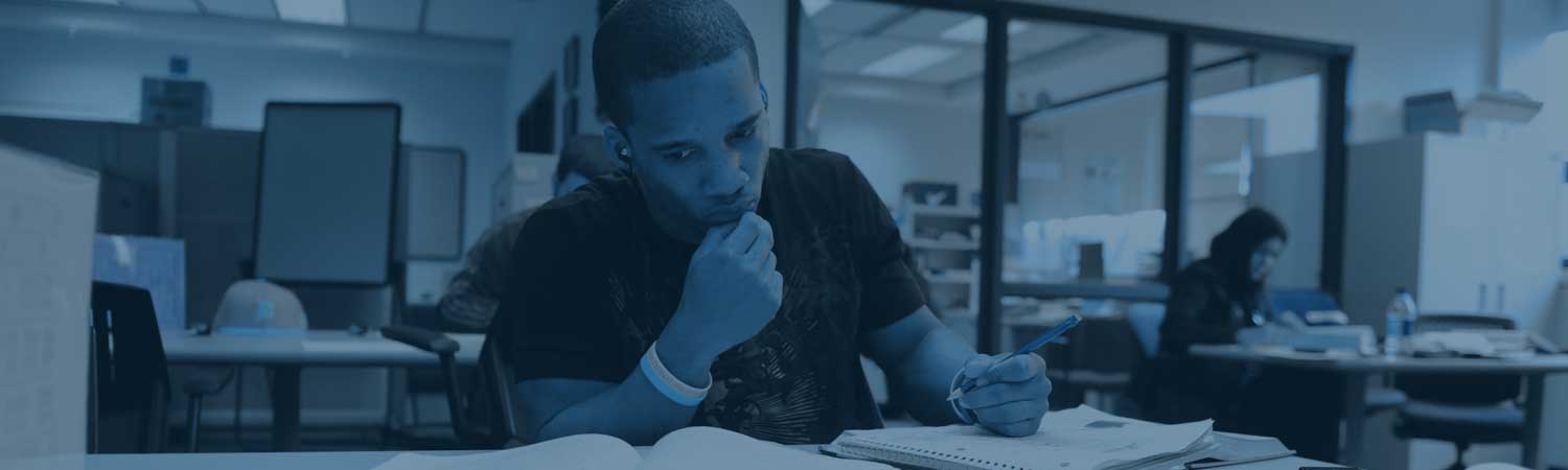 Young man working at a table