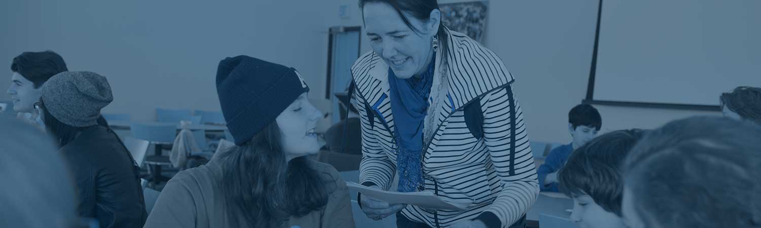 Professor working with French students