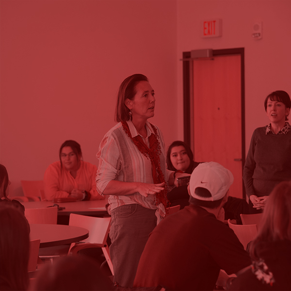 Student writing in French