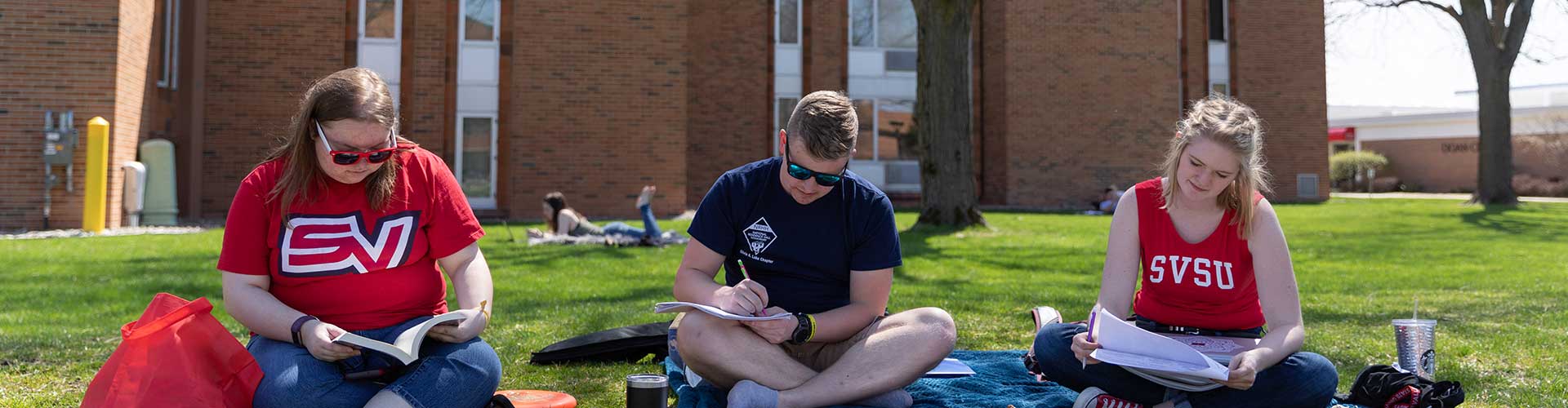Students Studying in Courtyard