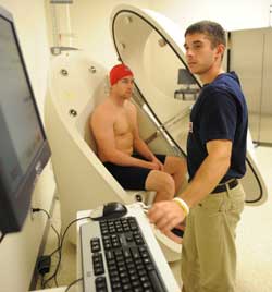 Students using bod-pod to test Saginaw Spirit players