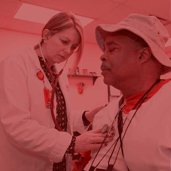 Student helping patient