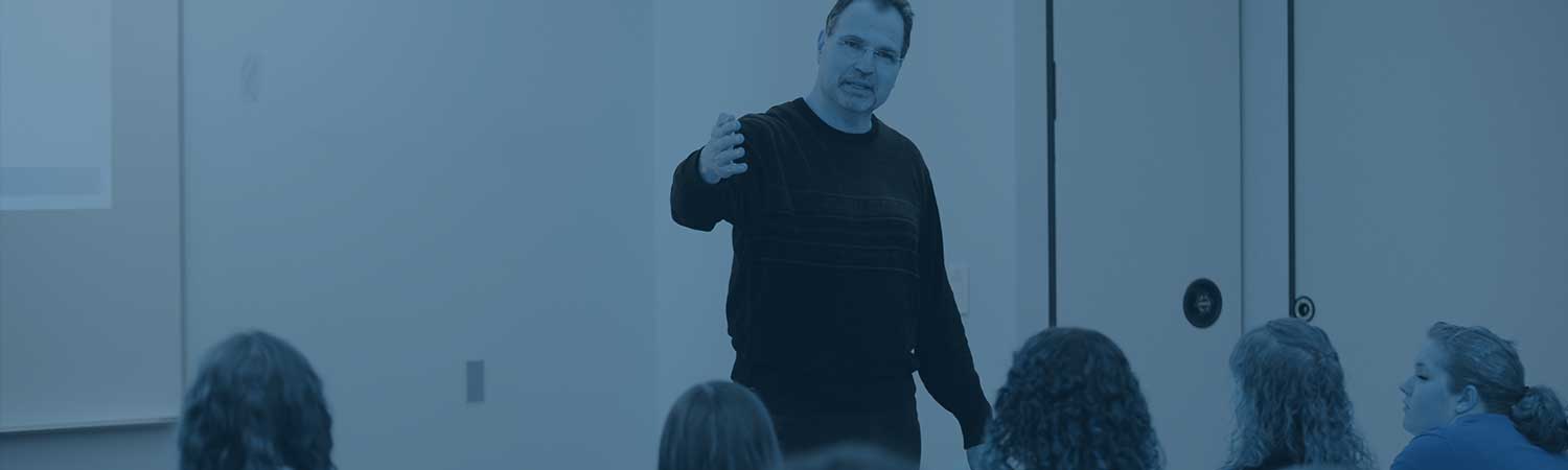 Professor talking to students