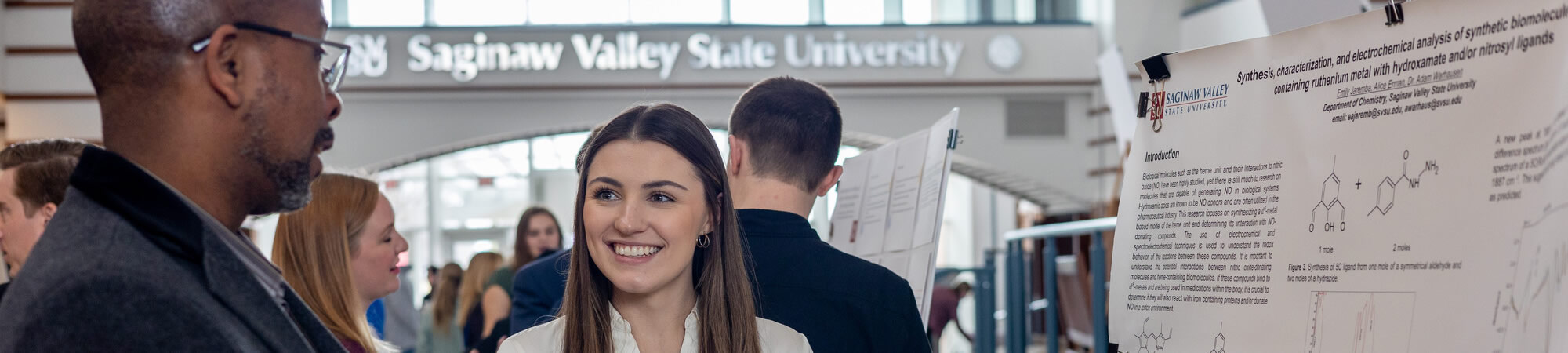 Student presenting research