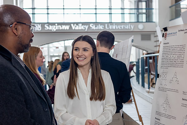 Student presenting research results