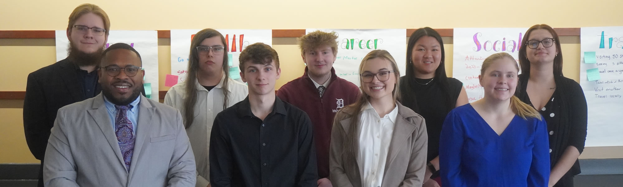 CPP students with program director, posing for photo