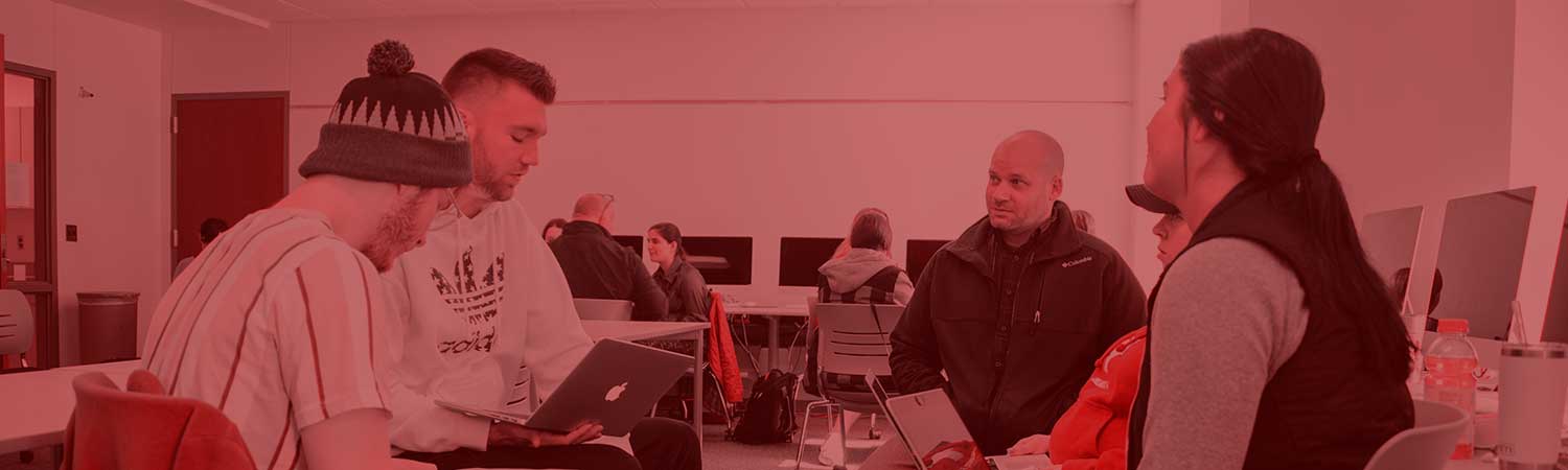 Technical writing students in a class discussion