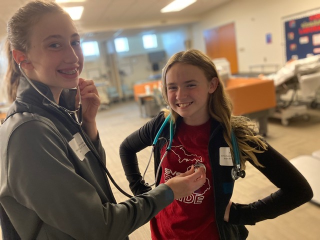 Participants utilize stethoscopes.