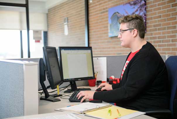 receptionist at front desk testing center