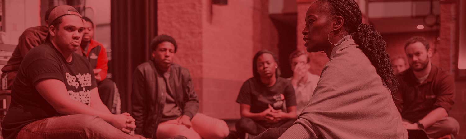 Students listening to a speaker