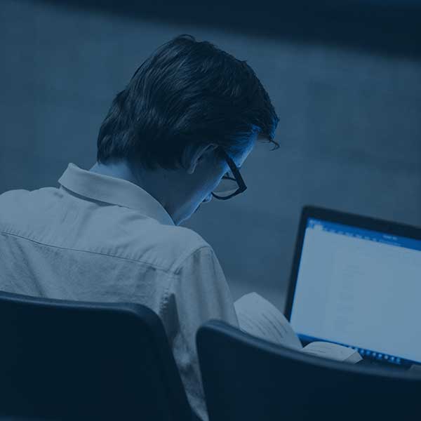 Student studying lines on a computer