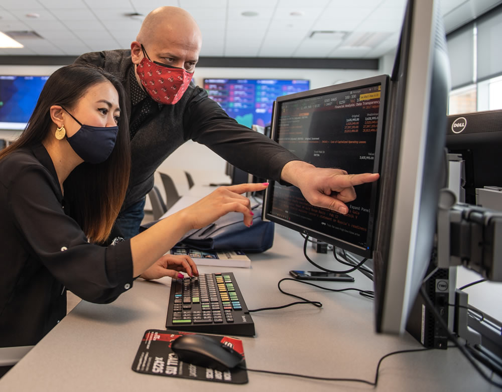 Student and faculty in Business