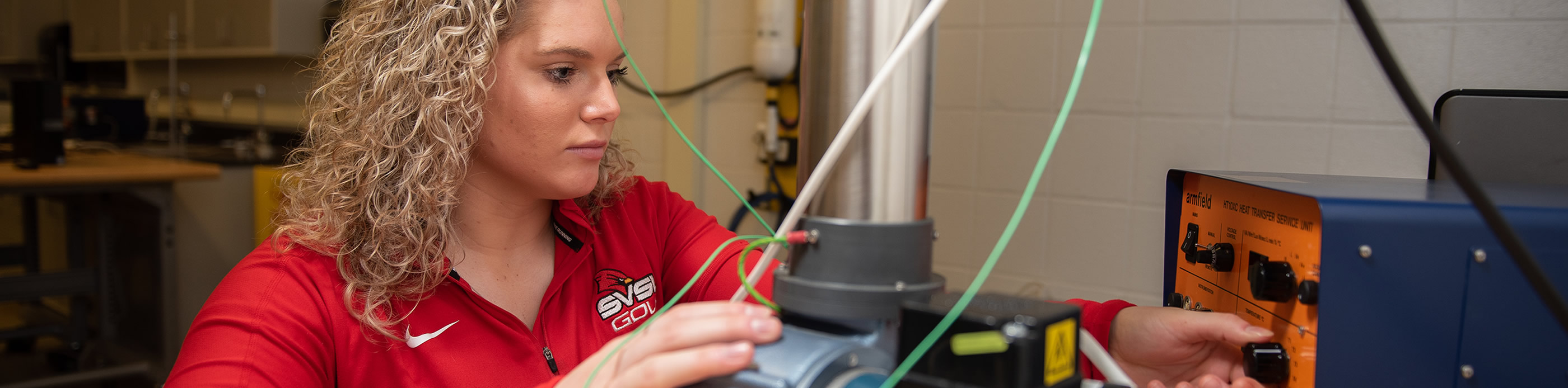 Mechanical engineering student working on a lab project