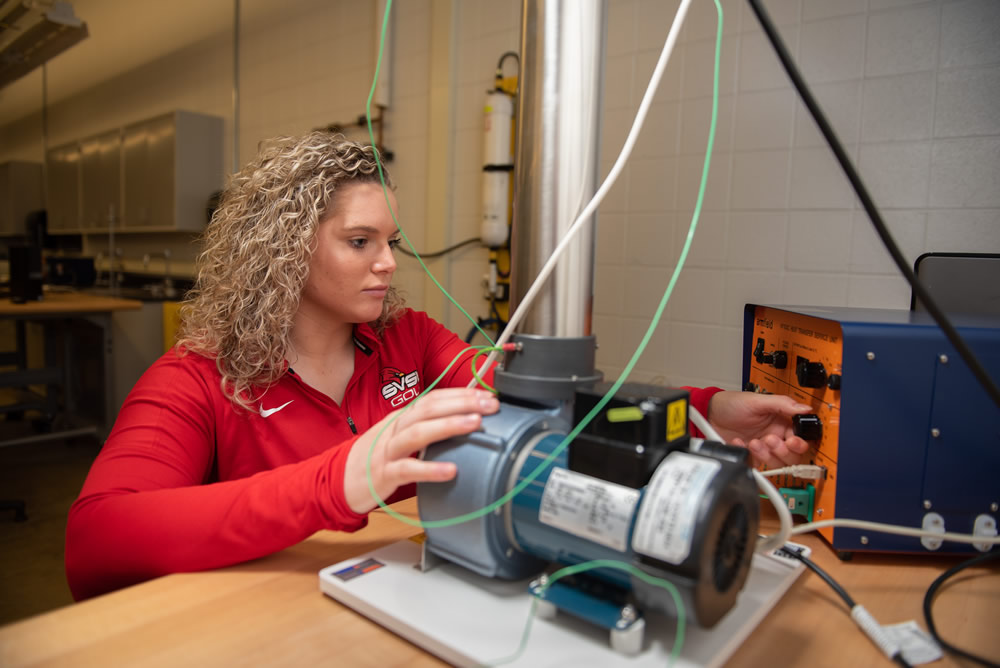 Mechanical engineering student working on a lab project