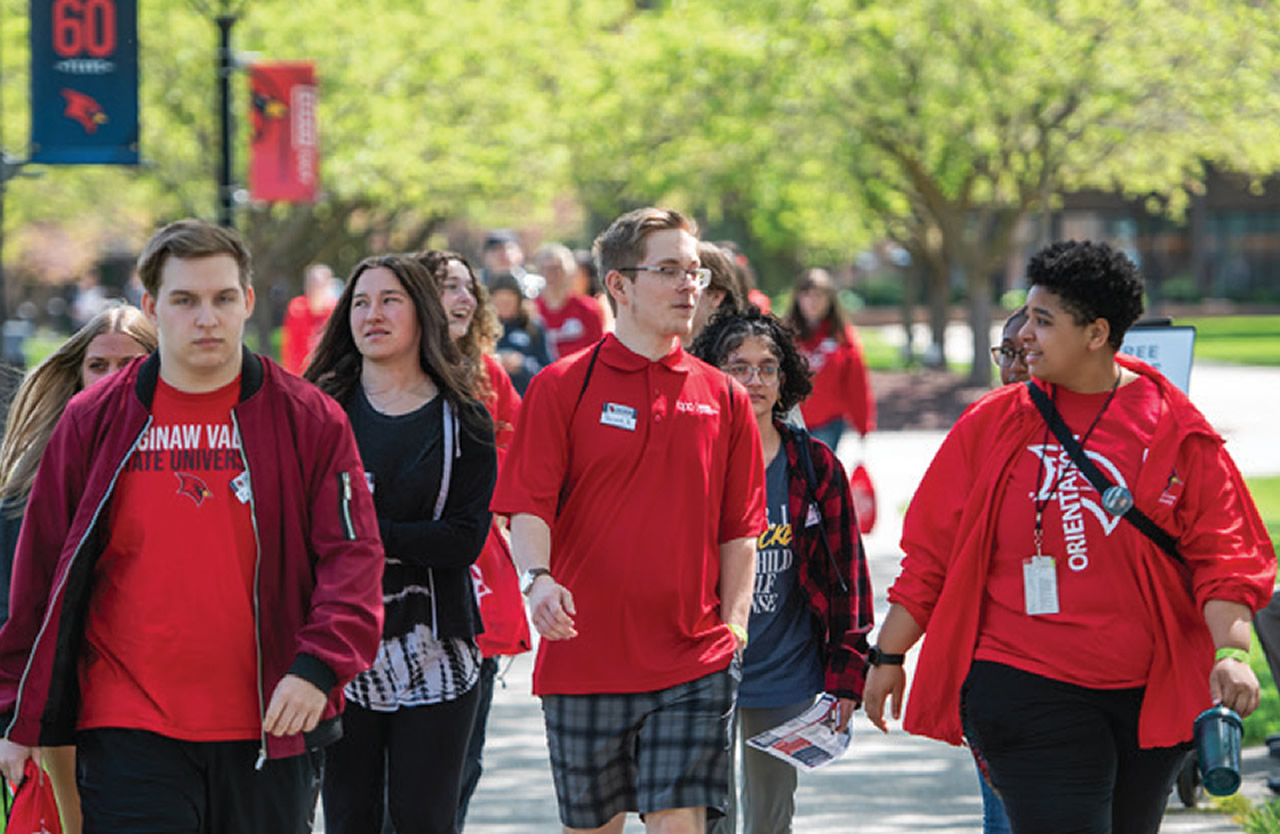 Campus tour guide with students