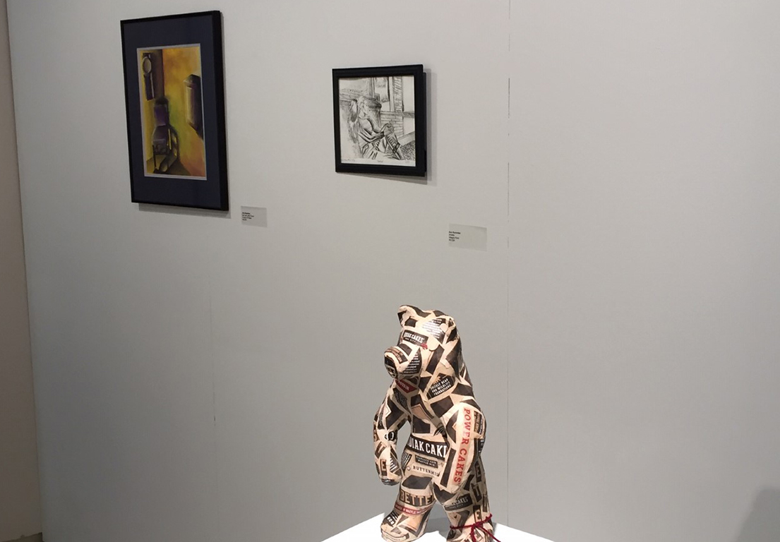 Student artwork featured includes watercolor, drawing and sculpture